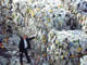 Doug Eichelberger with piles of trash